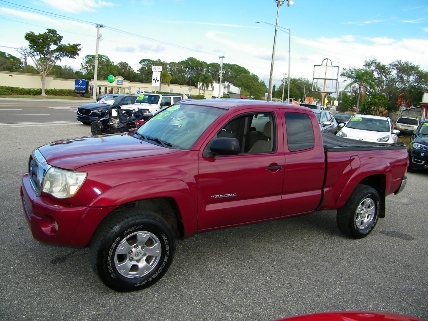 2007 Maroon /Grey Toyota Tacoma PreRunner Access Cab V6 2WD (5TETU62N87Z) with an 4.0L V6 DOHC 24V engine, Automatic transmission, located at 4000 Bee Ridge Road, Sarasota, FL, 34233, (941) 926-0300, 27.298664, -82.489151 - Photo#0